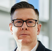 Alexander Hughes, CEO στέλεχος εταιρείας crypto trading, πορτρέτο